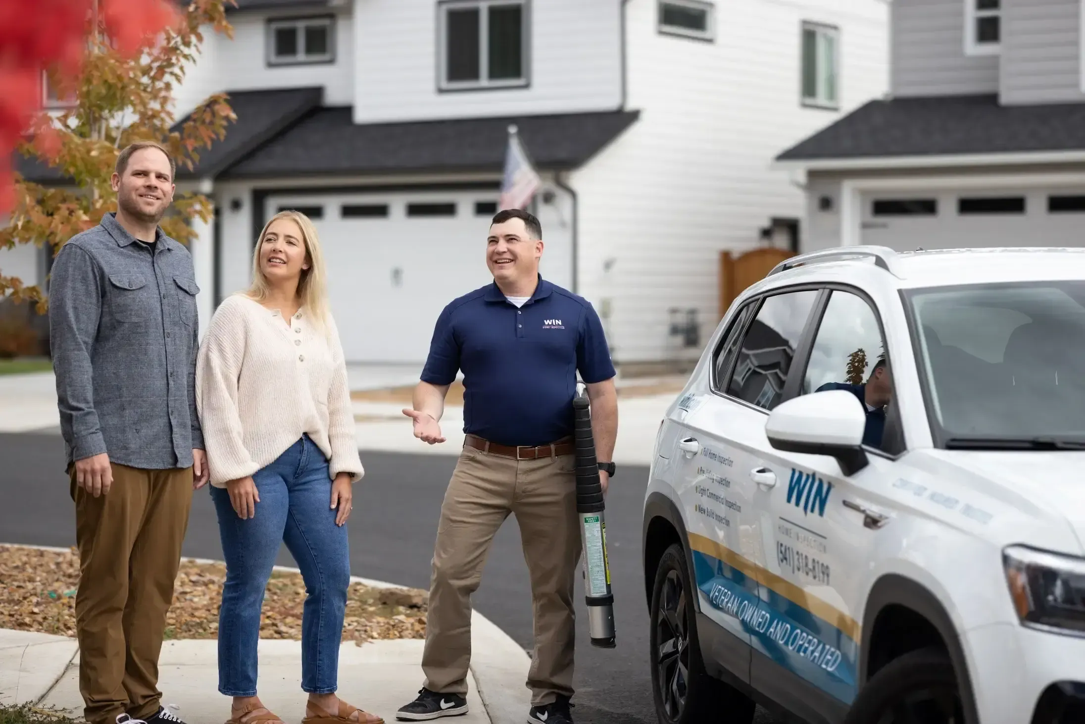 WIN Home Inspector with Clients.webp